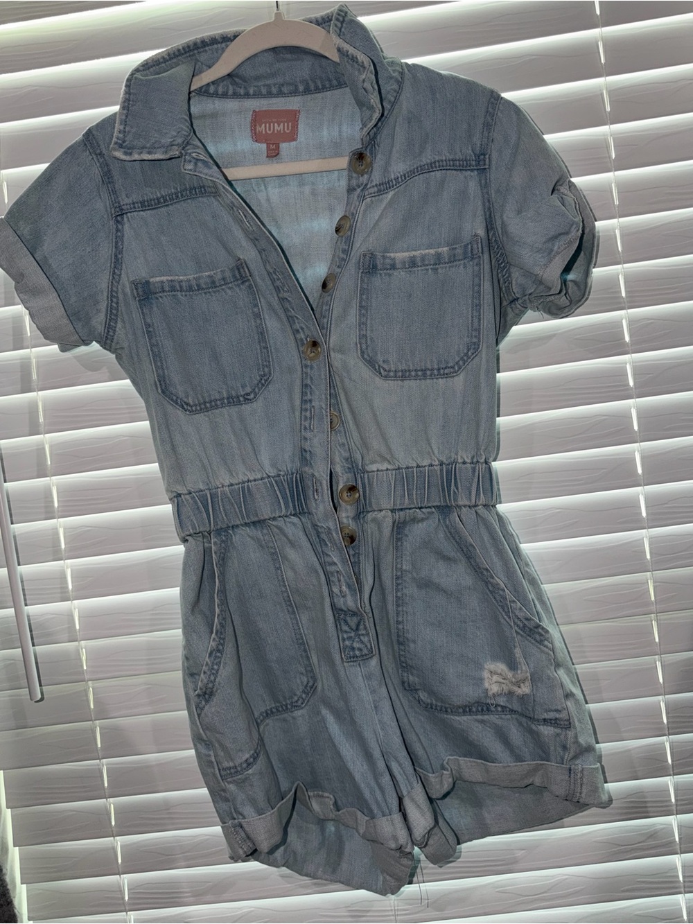 Show Me Your MuMu light blue denim romper with pink label